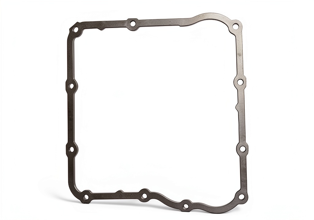 Transmission gasket being installed on a vehicle transmission housing